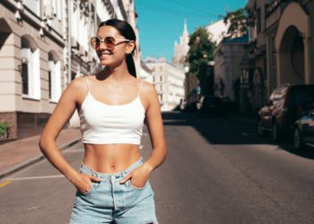 Young beautiful woman posing outdoors